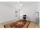 Home office with a desk, chair, and area rug at 19148 Dove Creek Dr, Tampa, FL 33647