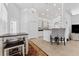 Well-equipped kitchen boasting white cabinetry and a breakfast nook at 19148 Dove Creek Dr, Tampa, FL 33647