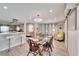 Bright dining area with glass table and open layout at 309 Fern Cliff Ave, Temple Terrace, FL 33617