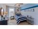 Nautical-themed bedroom with built-in storage at 3427 Hilltop Cir, Lakewood Ranch, FL 34211