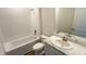 Bathroom featuring a vanity with marble countertops, a toilet and bathtub with shower at 18142 Beach Ranch Ter, Lakewood Ranch, FL 34211
