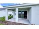 Covered patio that provides seamless indoor-outdoor living with room for lounging at 18142 Beach Ranch Ter, Lakewood Ranch, FL 34211