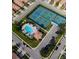 Stunning aerial view of community amenities with tennis courts and pool surrounded by lush landscaping at 227 Mystic Falls Dr, Apollo Beach, FL 33572