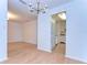 Charming dining space with hardwood floors and decorative lighting fixture, blending into other living spaces at 3203 W San Luis St, Tampa, FL 33629