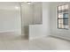 Light and airy foyer with tile floors and neutral color scheme at 227 Mystic Falls Dr, Apollo Beach, FL 33572