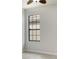 Bright bedroom with large window and neutral walls at 227 Mystic Falls Dr, Apollo Beach, FL 33572
