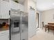 Modern kitchen with stainless steel refrigerator and ample storage at 8491 Essington St, New Port Richey, FL 34654
