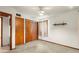 Bedroom with double door closet and built-in shelves at 1213 E Frierson Ave, Tampa, FL 33603