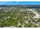 Wide aerial view highlighting home location in neighborhood setting at 1213 E Frierson Ave, Tampa, FL 33603