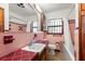 Pink and burgundy bathroom with tub and shower at 1213 E Frierson Ave, Tampa, FL 33603
