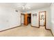 Bright bedroom with ceiling fan and access to bathroom at 1213 E Frierson Ave, Tampa, FL 33603