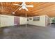 Attached garage with covered parking and wood ceiling at 1213 E Frierson Ave, Tampa, FL 33603