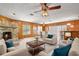Cozy living room featuring a stone fireplace and comfortable seating at 1213 E Frierson Ave, Tampa, FL 33603