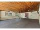Spacious garage with concrete floor and ample storage at 1213 E Frierson Ave, Tampa, FL 33603