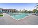 Relaxing resort-style pool with spacious deck at 4838 Sevilla Shores Dr, Wimauma, FL 33598