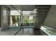 Modern entryway with glass walls, concrete staircase, and a small water feature at 1725 Gulf Rd, Tarpon Springs, FL 34689