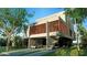 Modern home with concrete exterior and attached garage at 1725 Gulf Rd, Tarpon Springs, FL 34689
