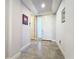 Elegant entryway with tile flooring and neutral color scheme at 13506 Messina Loop # 105, Bradenton, FL 34211