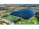 Aerial view of upscale community with lake and golf course at 13506 Messina Loop # 105, Bradenton, FL 34211