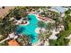 Resort-style pool with lounge chairs, cabanas, and a swim-up bar at 13506 Messina Loop # 105, Bradenton, FL 34211