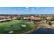Aerial view of golf course with clubhouse and homes at 13506 Messina Loop # 105, Bradenton, FL 34211
