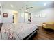 Spacious bedroom with hardwood floors and access to a walk-in closet at 13506 Messina Loop # 105, Bradenton, FL 34211