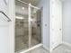 Spacious shower with glass enclosure and tile surround at 13506 Messina Loop # 105, Bradenton, FL 34211