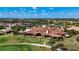 Aerial view of community clubhouse near golf course at 13506 Messina Loop # 105, Bradenton, FL 34211