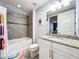 Bathroom with shower/tub combo, granite vanity, and tile flooring at 13506 Messina Loop # 105, Bradenton, FL 34211