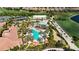 Community pool and surrounding amenities, including a clubhouse at 13506 Messina Loop # 105, Bradenton, FL 34211