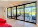 Private screened-in patio with outdoor furniture and golf course view at 13506 Messina Loop # 105, Bradenton, FL 34211