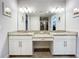 Bathroom boasts double vanity with granite countertop at 13506 Messina Loop # 105, Bradenton, FL 34211