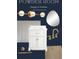 Powder room design featuring a single vanity, modern lighting, and wood plank flooring at 320 W Park Ave, Tampa, FL 33602