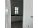 Bathroom with white cabinets and patterned floor tiles at 320 W Park Ave, Tampa, FL 33602