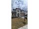 Stunning two-story home with a tile roof, manicured landscaping, and a welcoming front entrance at 320 W Park Ave, Tampa, FL 33602