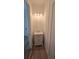 Stylish powder room with wainscoting, a modern vanity, and elegant lighting at 320 W Park Ave, Tampa, FL 33602
