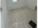 Unfinished room with light gray floor and white walls at 320 W Park Ave, Tampa, FL 33602