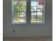 Double windows with views of the neighborhood at 320 W Park Ave, Tampa, FL 33602