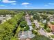Bird's eye view of house, neighborhood, and lush greenery at 7127 Otter Creek Dr, New Port Richey, FL 34655