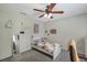 Charming bedroom with a floral bedspread and plenty of natural light at 7127 Otter Creek Dr, New Port Richey, FL 34655
