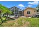 Home with fenced backyard, pool, and patio at 7127 Otter Creek Dr, New Port Richey, FL 34655