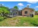 Home with fenced backyard, pool, and patio at 7127 Otter Creek Dr, New Port Richey, FL 34655