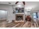 Stone fireplace and built-in shelving in the living room at 7127 Otter Creek Dr, New Port Richey, FL 34655