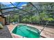 Escape to your own private oasis with a screened pool at 7127 Otter Creek Dr, New Port Richey, FL 34655