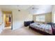 Main bedroom with large bed and dresser at 905 John Hunter Ct, Brandon, FL 33511