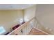 Loft overlooking the living room with a railing at 905 John Hunter Ct, Brandon, FL 33511