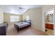 Main bedroom with ensuite bathroom access at 905 John Hunter Ct, Brandon, FL 33511