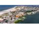 Wide aerial view of the coastline, highlighting condo location and beach access at 10301 Gulf Blvd # 201, Treasure Island, FL 33706