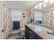 Clean bathroom, featuring a shower/tub combo, granite countertop and coastal decor at 10301 Gulf Blvd # 201, Treasure Island, FL 33706