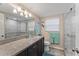 Updated bathroom with granite countertop and walk-in shower at 10301 Gulf Blvd # 201, Treasure Island, FL 33706